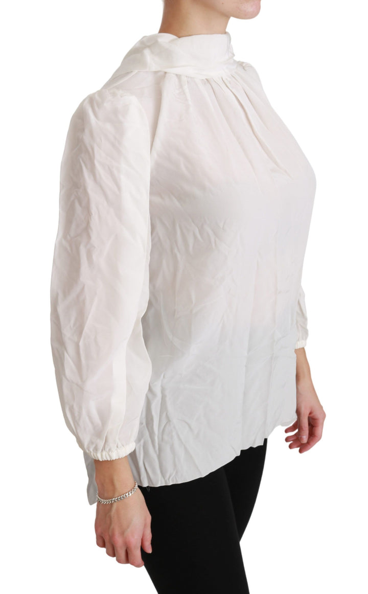 Elegant white silk blouse with turtleneck