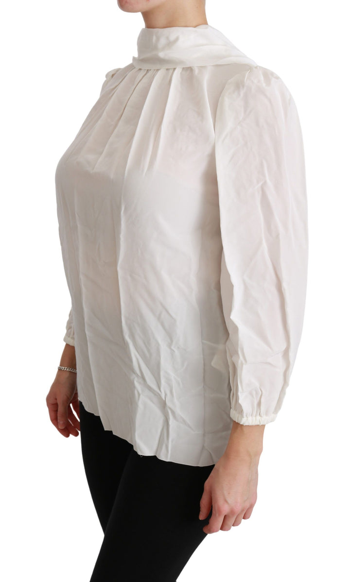 Elegant white silk blouse with turtleneck
