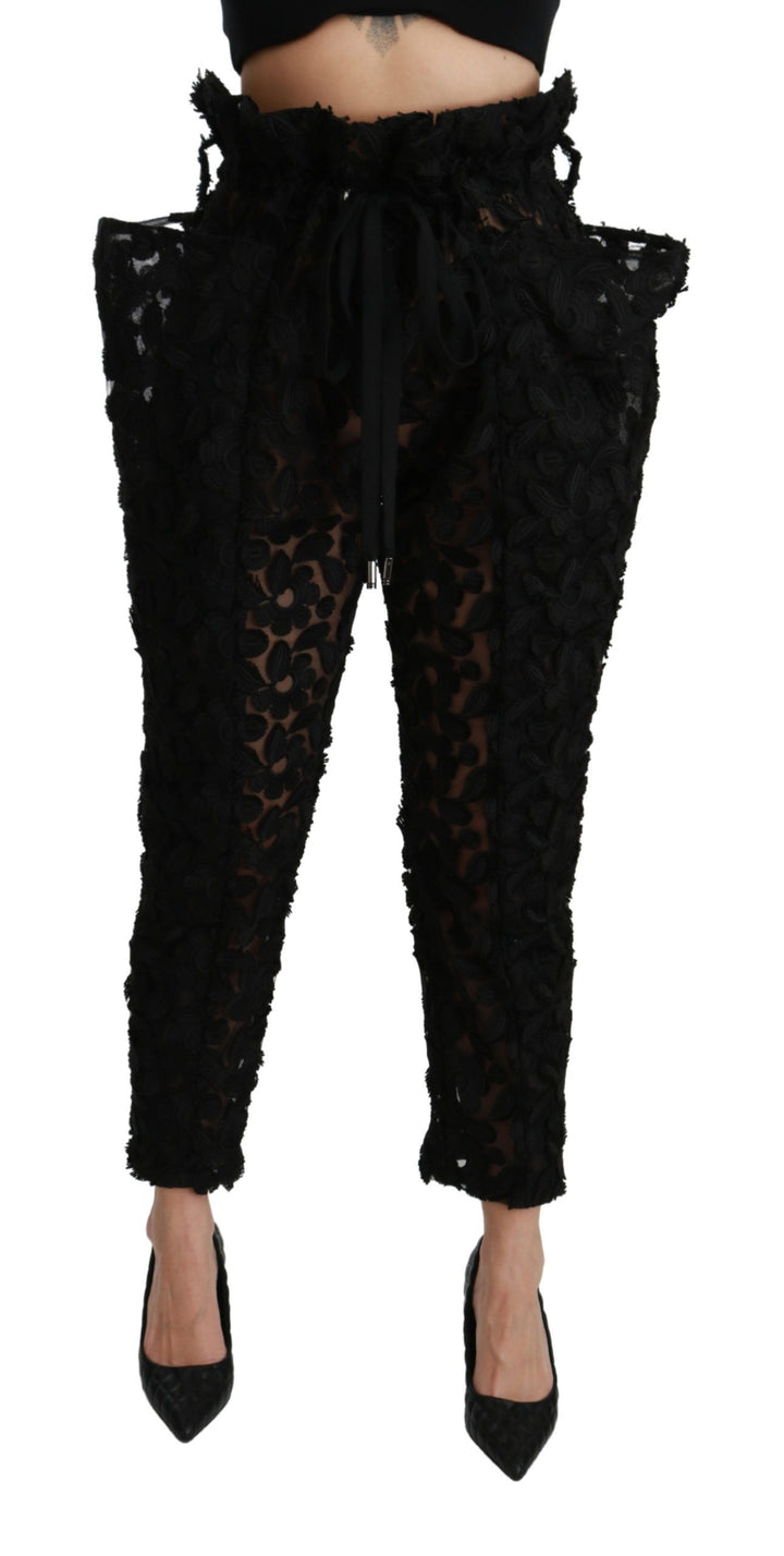 Schwarze, florale, spitz zulaufende Hose mit hoher Taille
