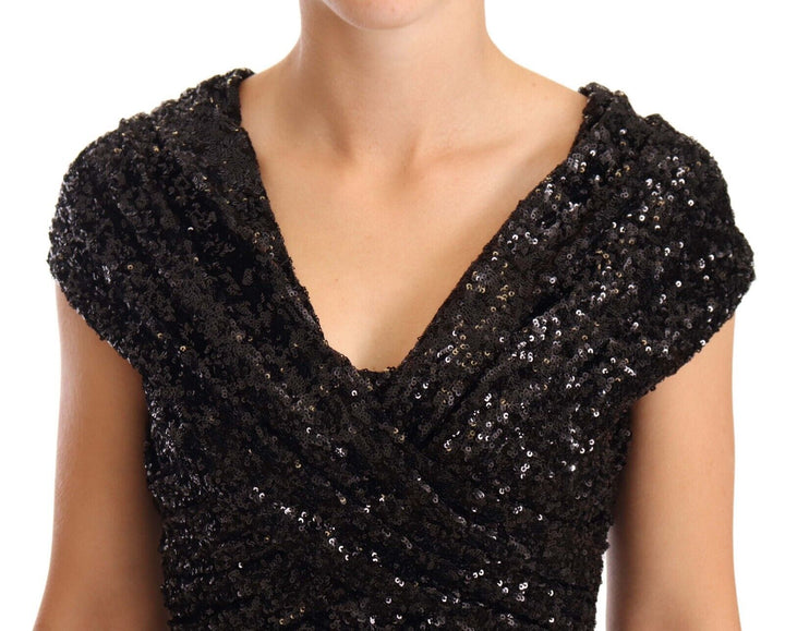 Elegant black sequin dress with open shoulders