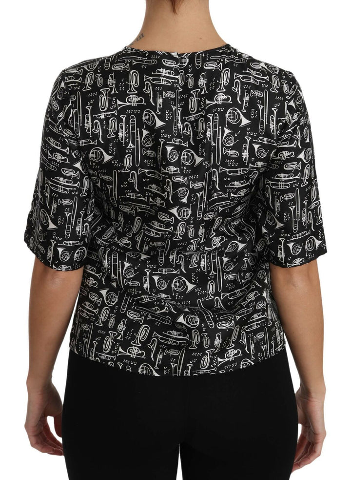 Schwarze Seidenbluse mit Musikinstrumenten-Druck