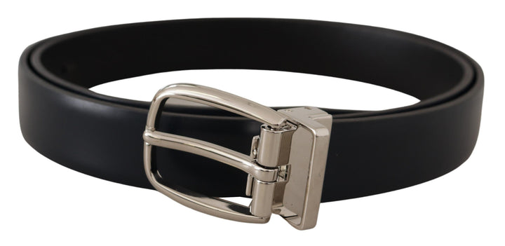 Elegant black leather belt with silver buckle