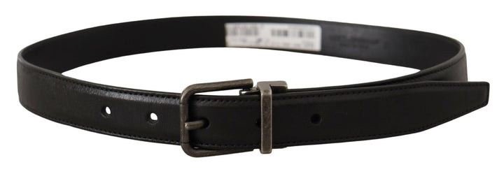 Elegant black leather belt with metal buckle