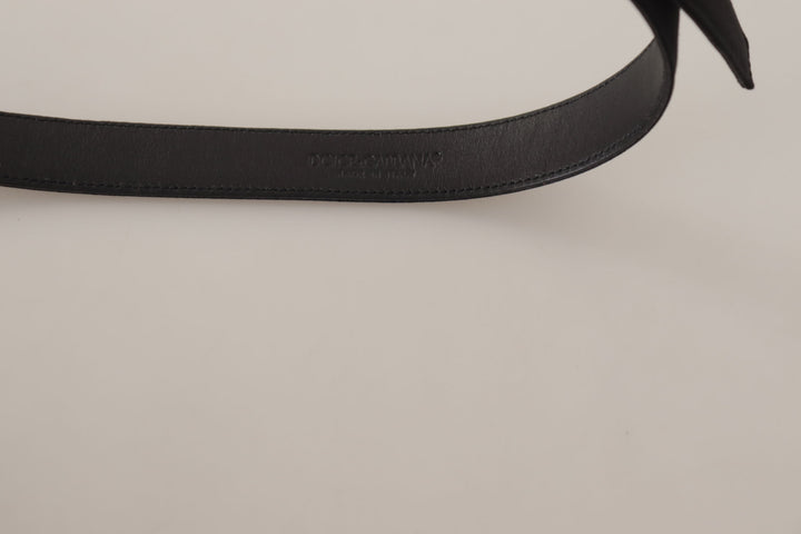 Elegant black leather belt with metal buckle