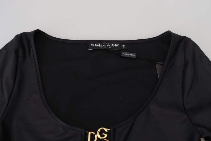 Elegant black top with 3/4 sleeves and gold decoration