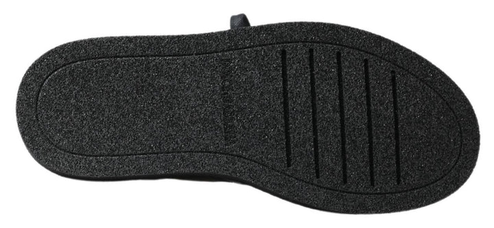 Schwarze Leder-Slipper mit Stretch-Stiefeln
