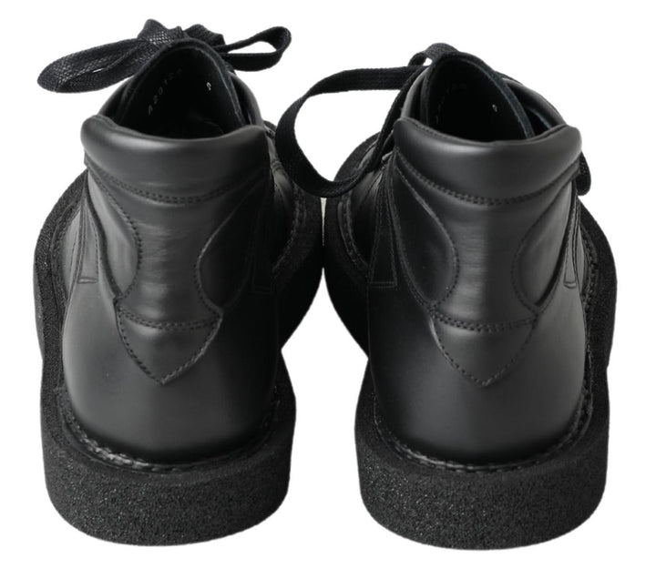 Schwarze Leder-Slipper mit Stretch-Stiefeln