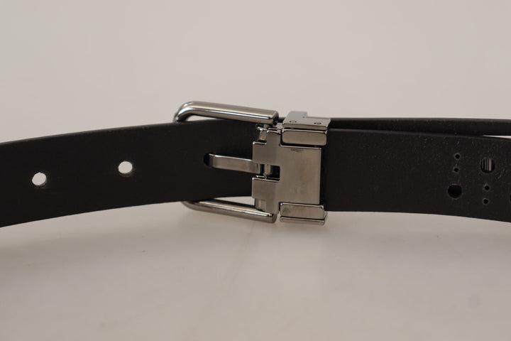 Elegant black leather belt with metal buckle
