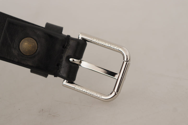 Elegant black leather belt with metal buckle