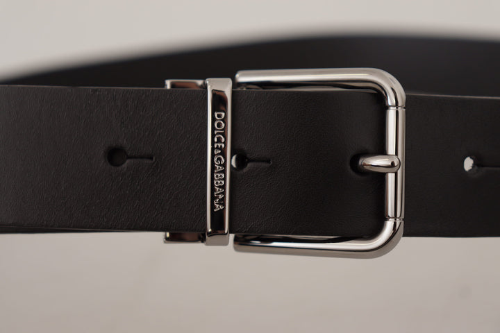 Elegant black leather belt with metal buckle