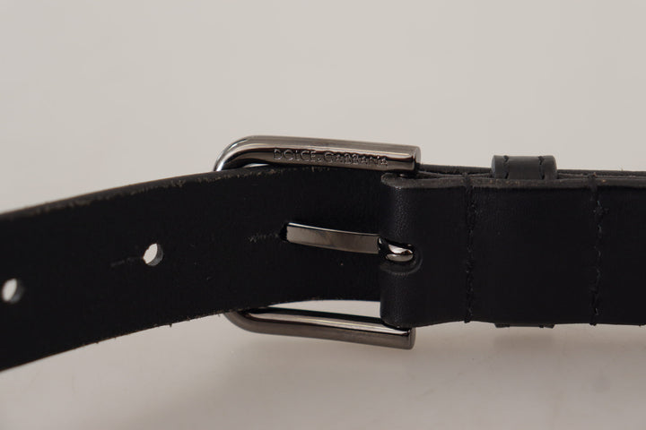 Elegant black leather belt with metal buckle