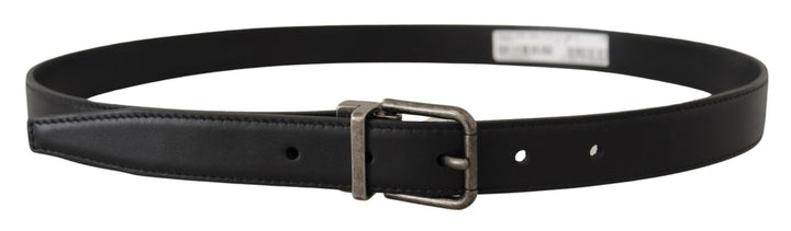 Elegant black leather belt with metal buckle