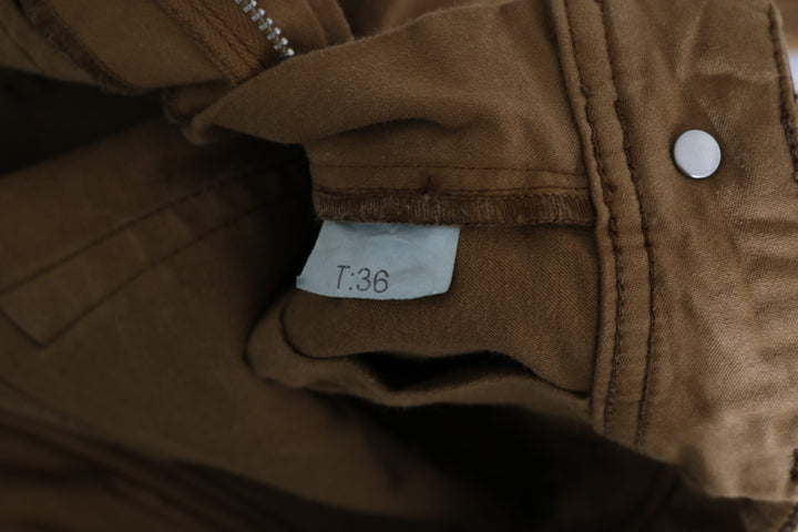 Braune Baumwolljeans mit mittlerer Taille und schmaler Passform aus Denim