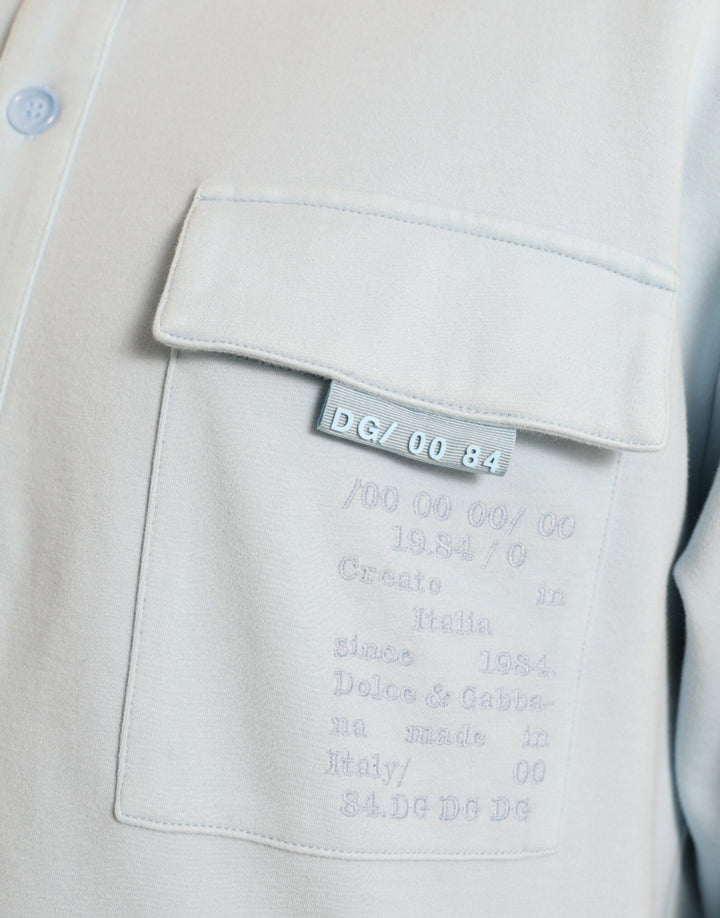 Hellblauer Pullover aus Baumwolle mit Knöpfen