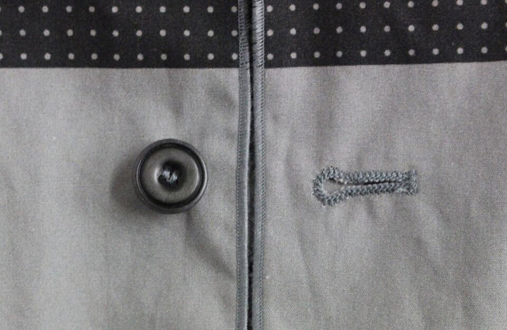 Graues gepunktetes Kleid Weste Gilet Weste