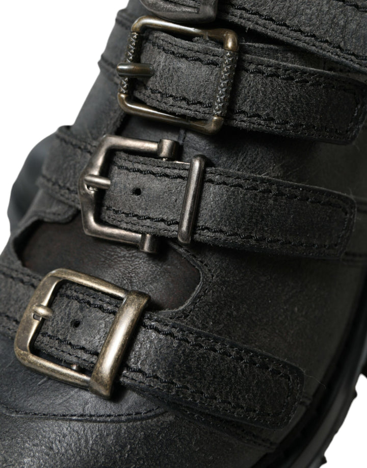 Black leather boots with ankle strap