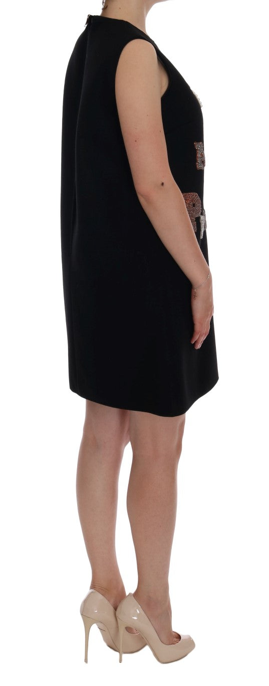 Black wool princess dress with crystal