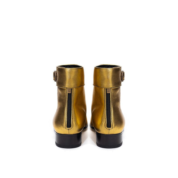 Gold-colored leather boots