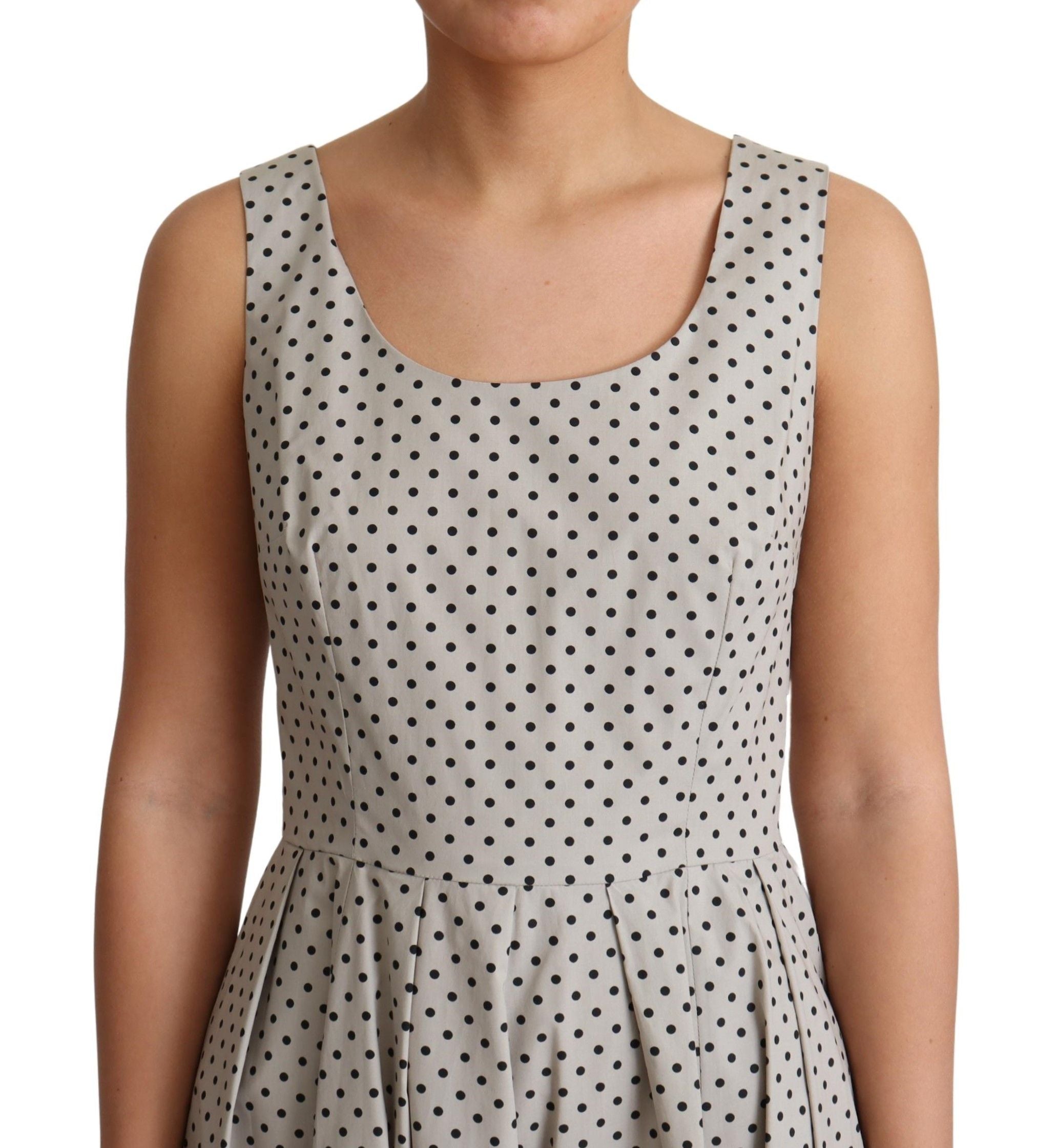 Polka dot beige sleeveless A-line dress