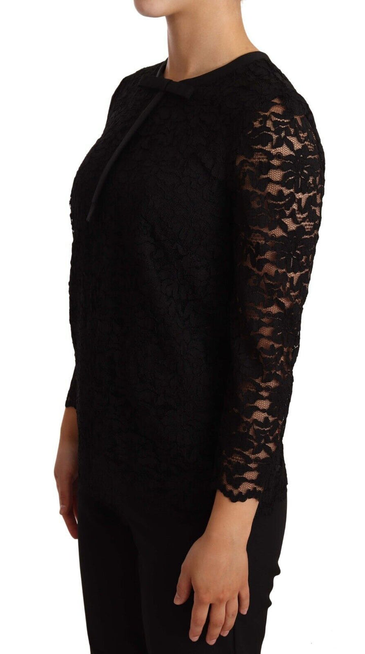 Elegant black long-sleeved top made of floral lace