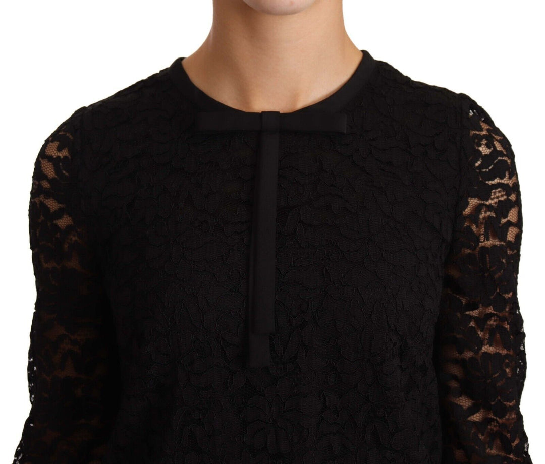 Elegant black long-sleeved top made of floral lace