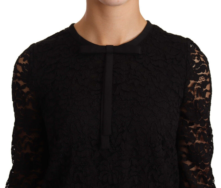 Elegant black long-sleeved top made of floral lace