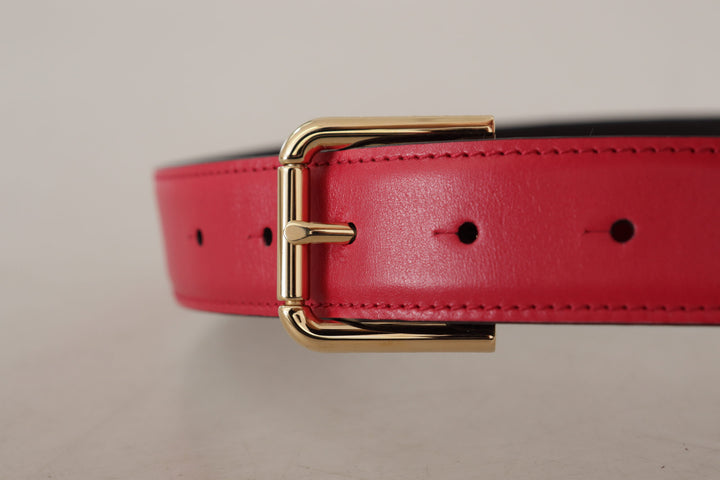 Elegant red leather belt with gold-colored buckle