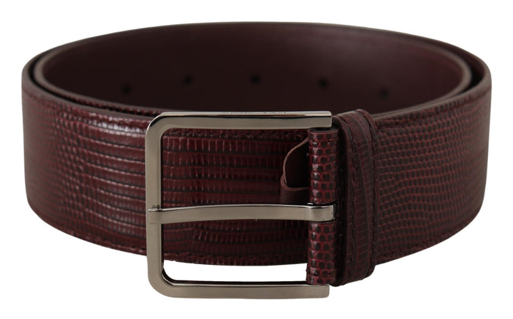 Elegant chestnut brown leather belt with engraved buckle
