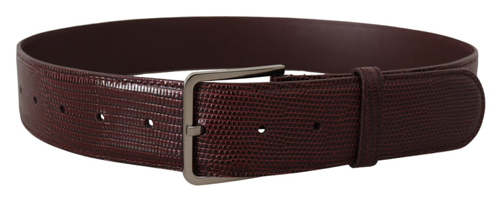 Elegant chestnut brown leather belt with engraved buckle