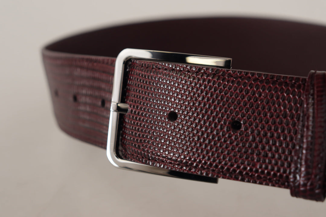 Elegant chestnut brown leather belt with engraved buckle