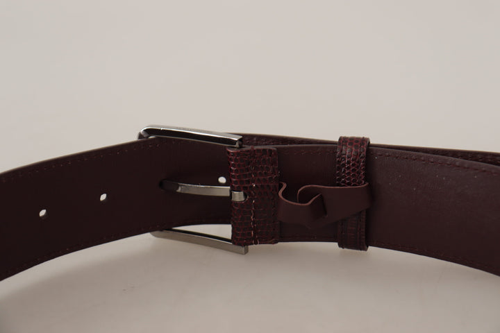 Elegant chestnut brown leather belt with engraved buckle
