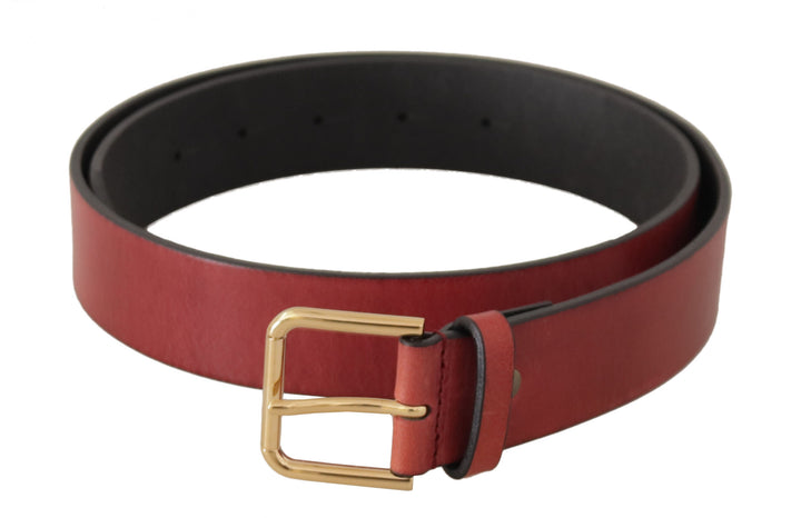 Elegant red leather belt with engraved buckle