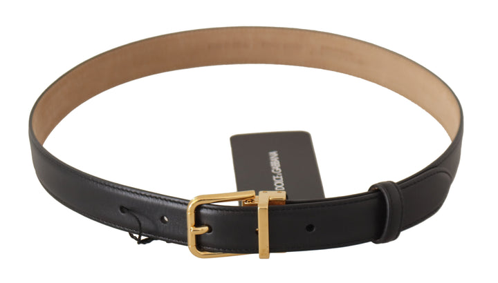 Elegant black leather belt with engraved buckle
