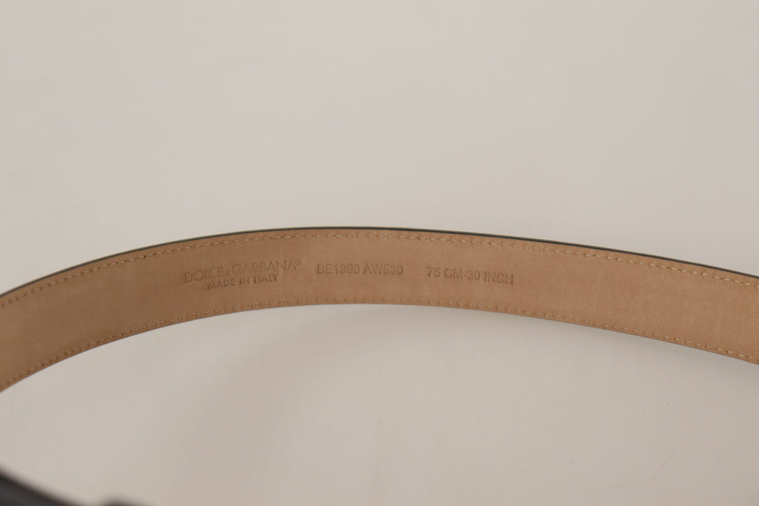 Elegant black leather belt with engraved buckle