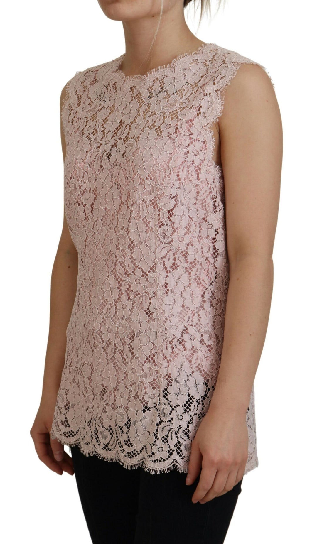 Elegant sleeveless blouse made of transparent lace in pink