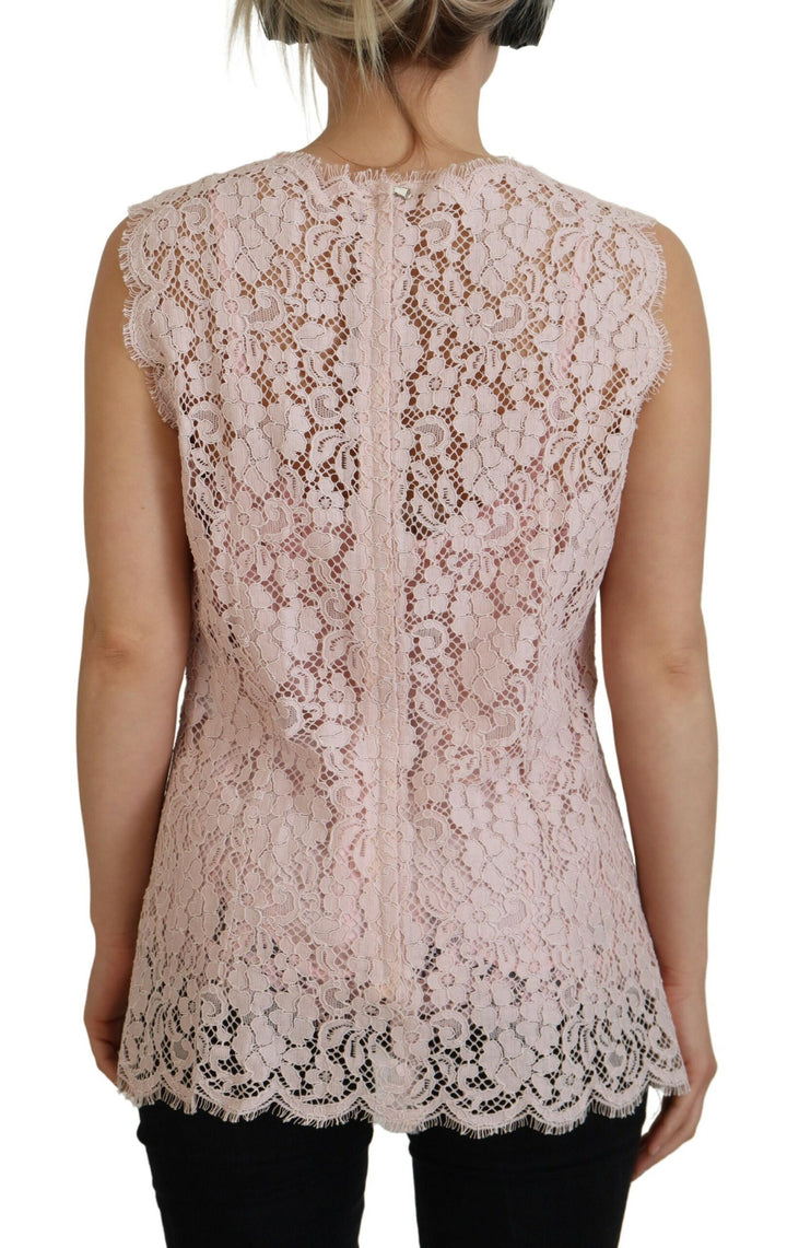 Elegant sleeveless blouse made of transparent lace in pink