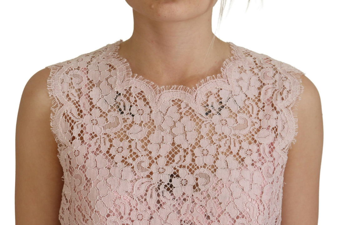 Elegant sleeveless blouse made of transparent lace in pink