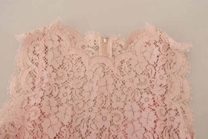 Elegant sleeveless blouse made of transparent lace in pink