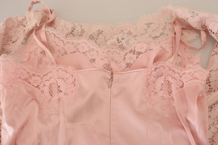 Elegant sleeveless blouse made of transparent lace in pink