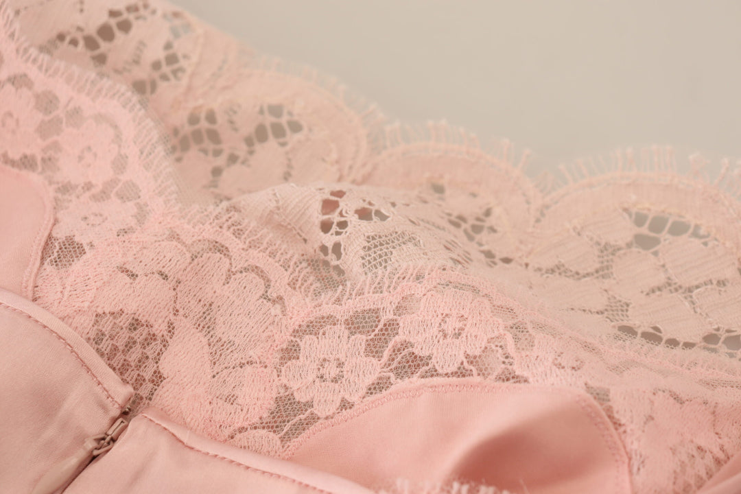 Elegant sleeveless blouse made of transparent lace in pink
