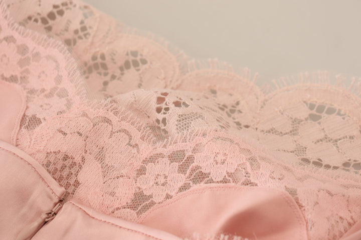 Elegant sleeveless blouse made of transparent lace in pink