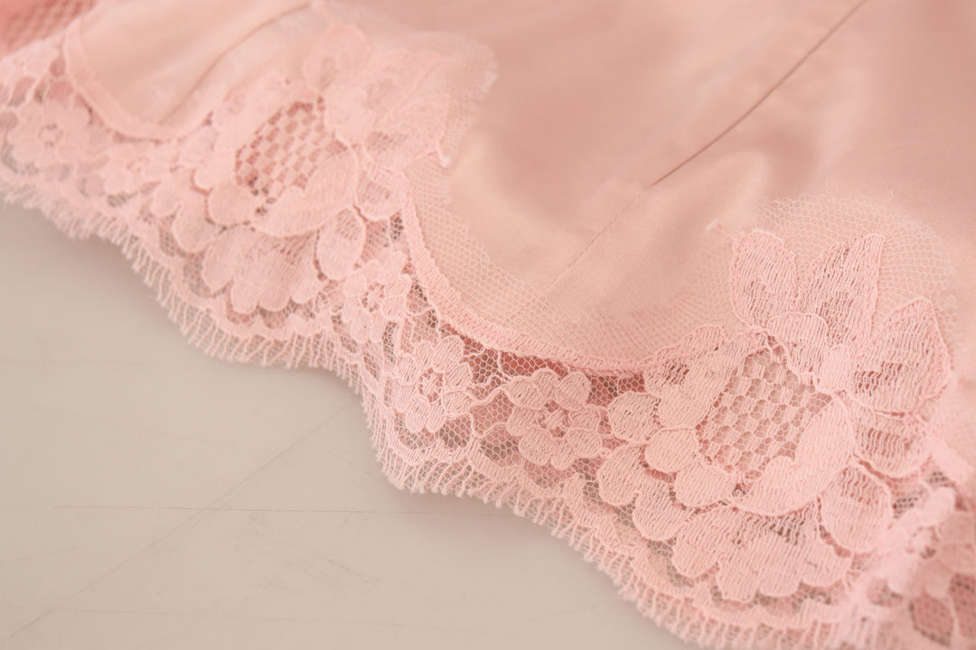 Elegant sleeveless blouse made of transparent lace in pink