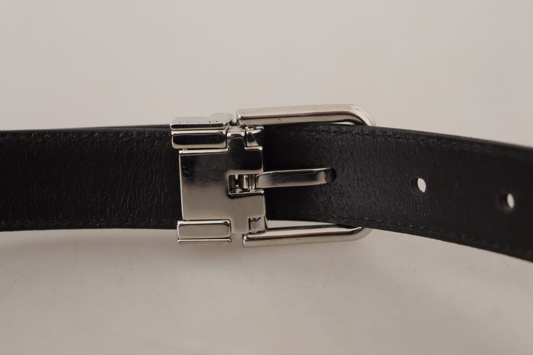 Smooth black leather belt with metal buckle