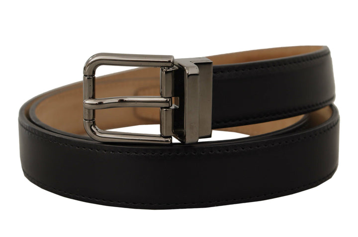 Smooth black leather belt with metal buckle