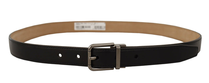 Smooth black leather belt with metal buckle