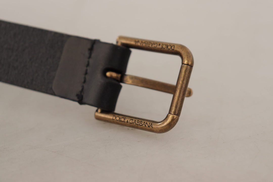Elegant black leather belt with metal buckle