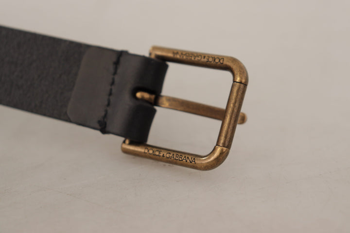 Elegant black leather belt with metal buckle