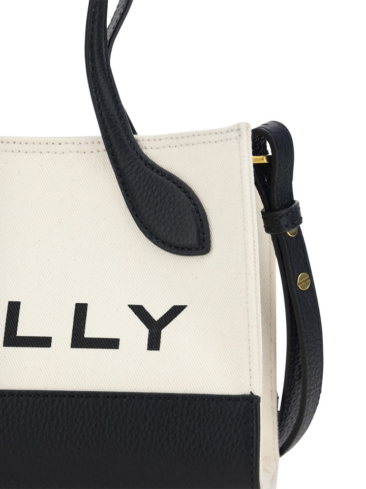 Schicke kontrastierende Mini-Lederhandtasche