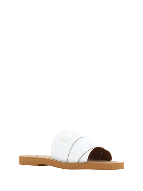 Elegant white cotton slide sandals