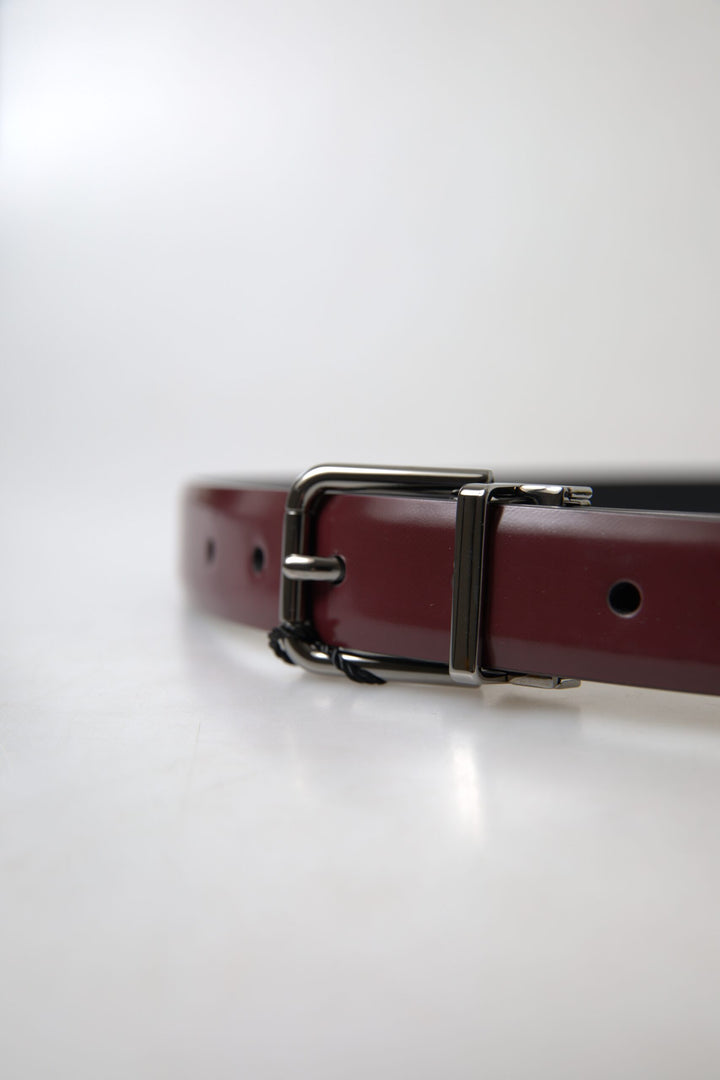 Elegant burgundy leather belt with metal buckle